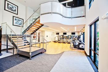 Two-story fitness center with yoga and spin room